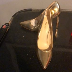 Gold pumps , never worn, size 8
